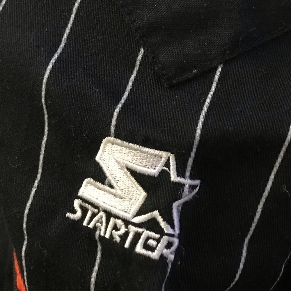 Jersey with sown letters and numbers